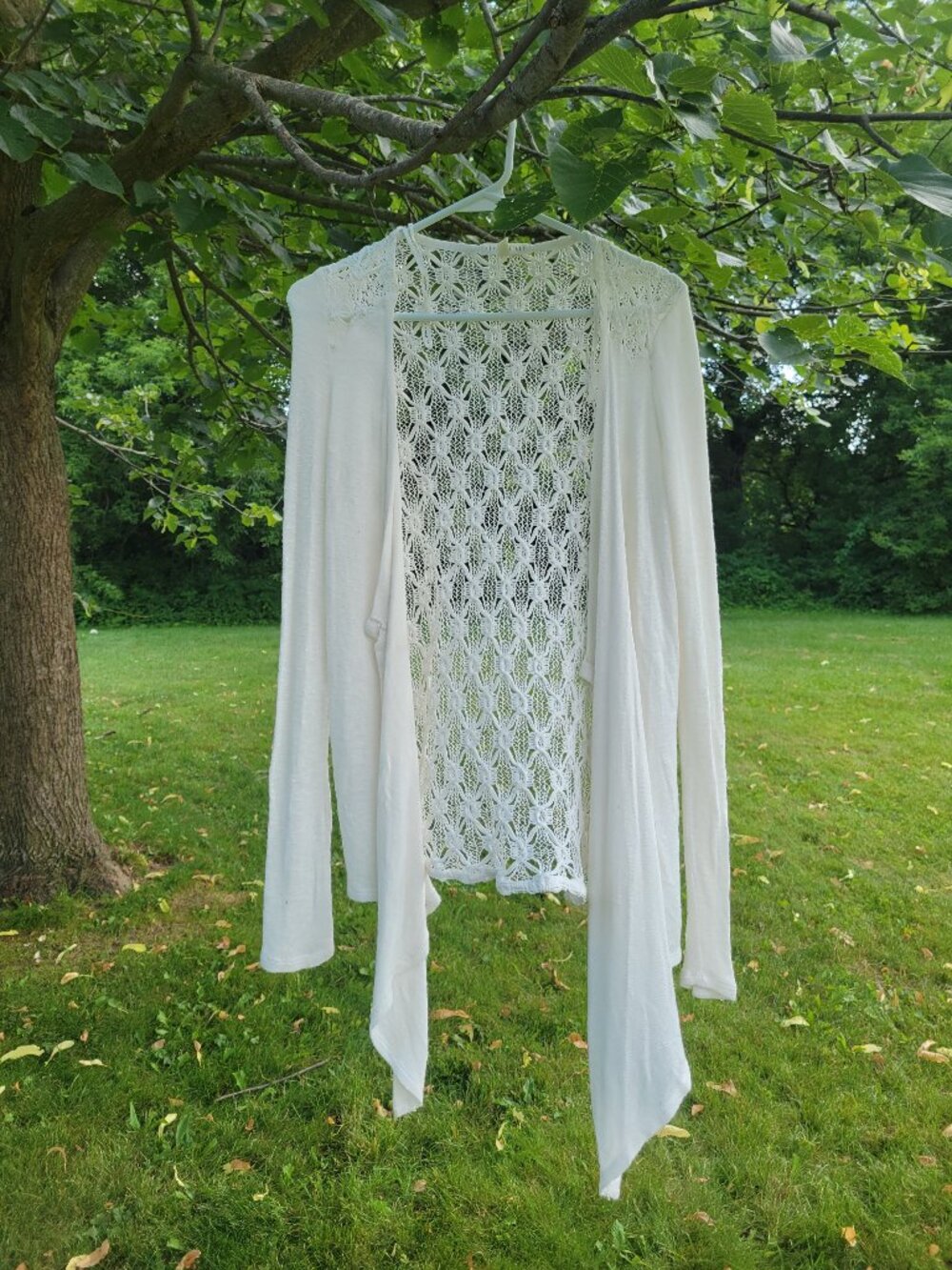 Beautiful white crochet/lace cover up cardigan. Size medium.